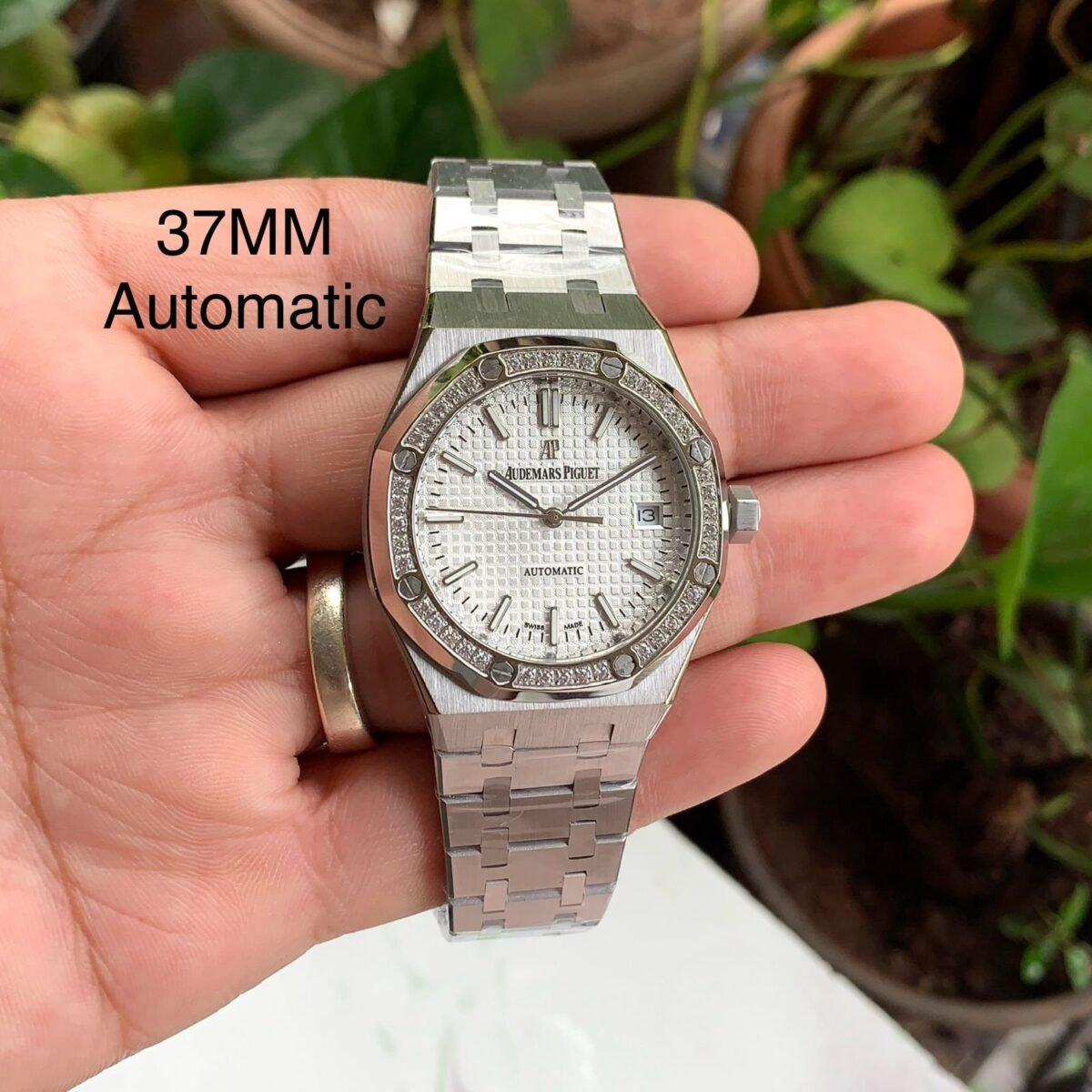 Audemars Piguet Ladies White Dial Diamond Bezel - gallery